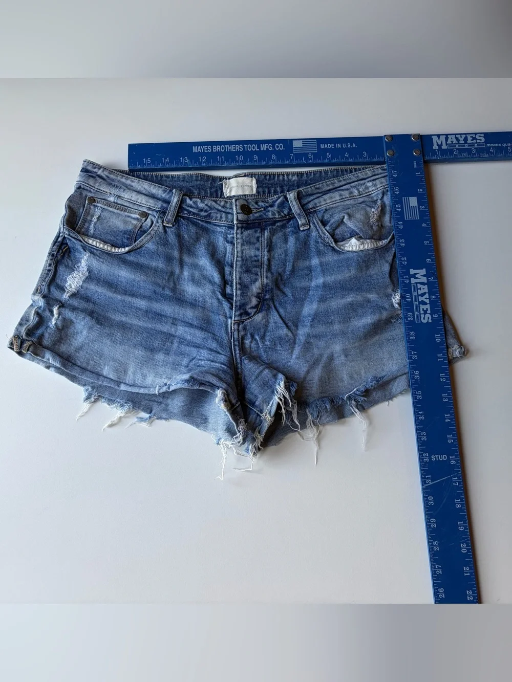 Buckle Gilded Intent Light Blue Distressed Denim Cutoff Shorts